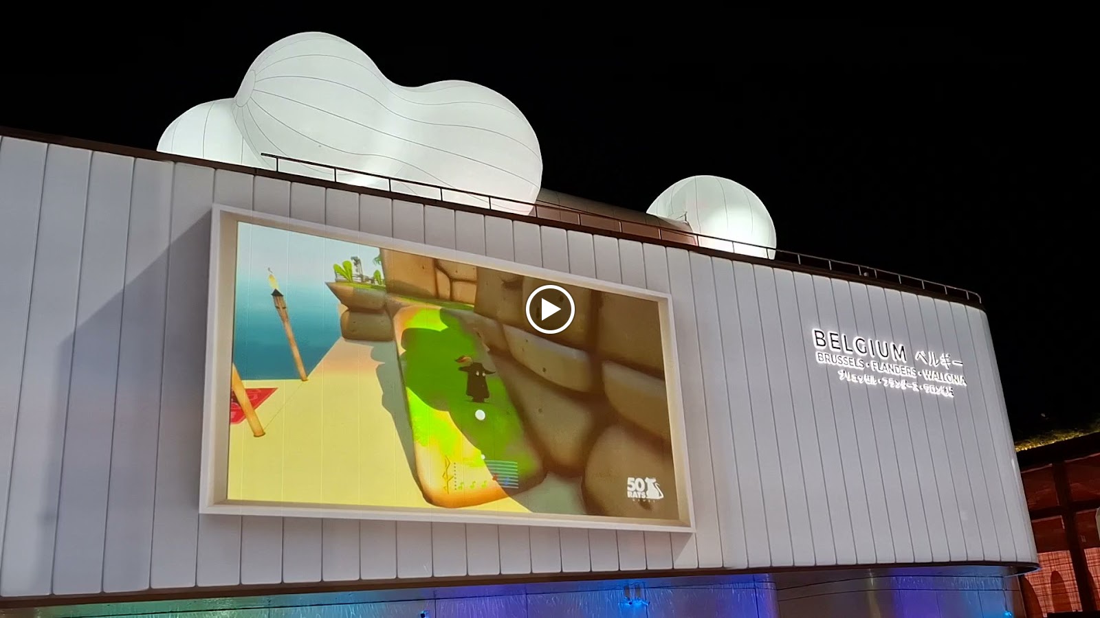 Showreel of Belgian video games screened on the façade of the Belgian pavilion